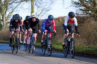 Lap 2 - a small chase group hunt down the lone leader
