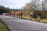 Lap 3 - the bunch is stretched as eventual winner Tom Martin (Wheelbase CabTech Castelli) shows himself