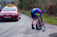 Lap 3 - Craig Paterson (Vanelli-Project GO) jumps off his bike and checks what's wrong; it's a loose crank
