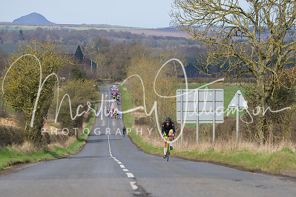 Lap 4 - Tom Martin (Wheelbase CabTech Castelli) has escaped the bunch and is chasing the front two a minute ahead on his own