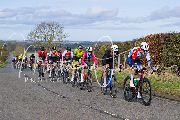 Lap 4 - the bunch looks less than organised